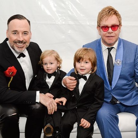 Elton John and David Furnish with their two kids.